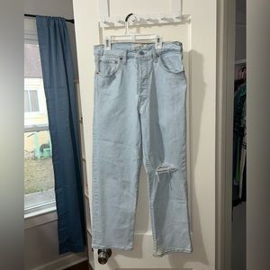 Levi Women’s light wash ribcage straight ankle jeans, size 30 lightly distressed
